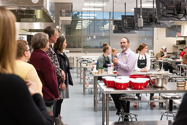 John Arrowood stands in the middle of the Nutrition lab during a demonstration for AppFuel