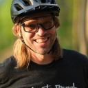 Kristian Jackson who is smiling and wearing a bike helmet