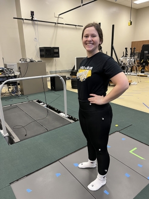 Person standing in the Exercise Science Lab