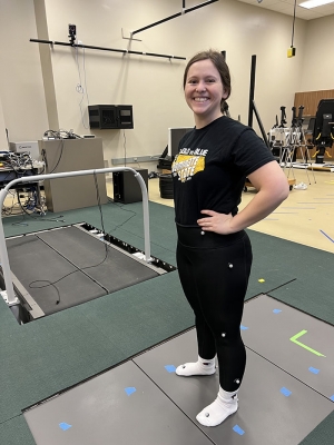 Person standing in the Exercise Science Lab 