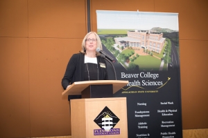 Marie Huff speaking at Celebration of Giving