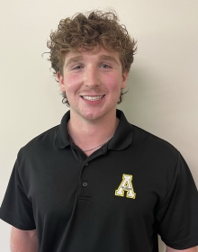 Logan Sorensen Young man wearing a black polo shirt with an Appalachian Block A on it
